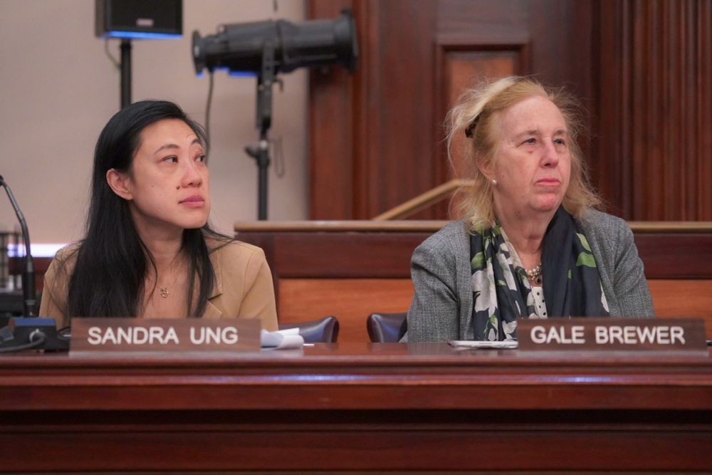 CM Ung and CM Brewer at their seats in council chambers