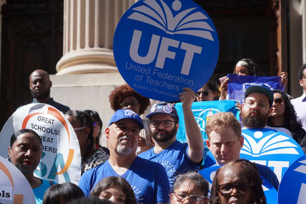 The United Federation of Teachers rally against public school cuts at the Tweed Courthouse. 