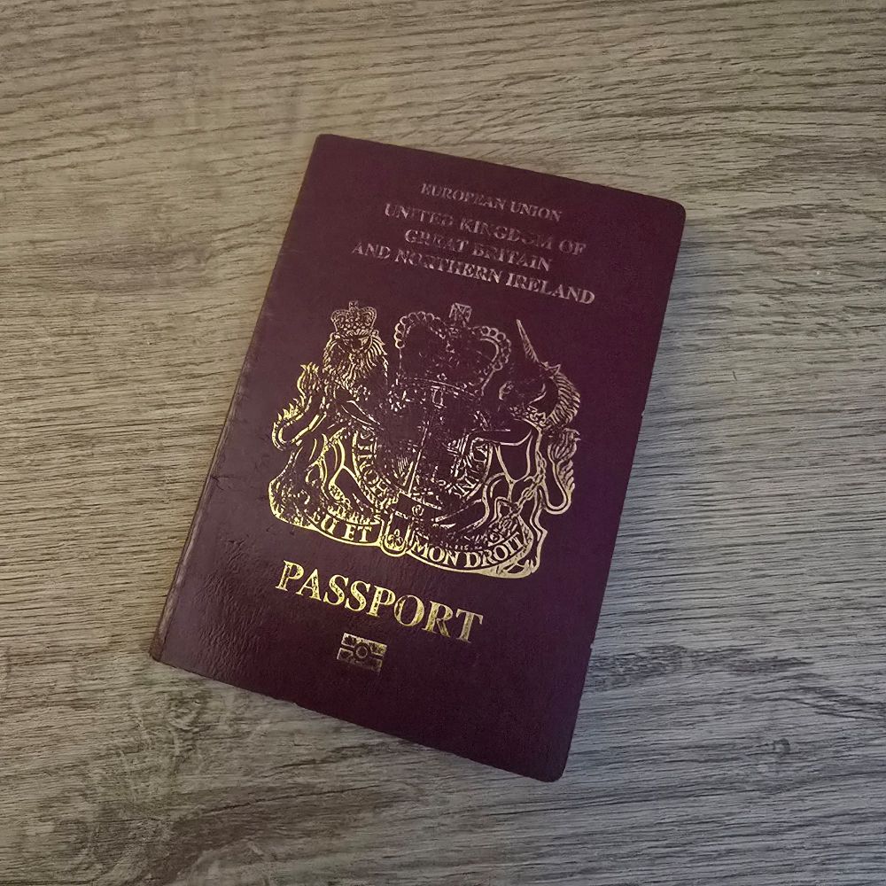 My old passport which I now need to send off to transform into a new Blue Passport. A bit like a shit 'Stars in their Eyes'.