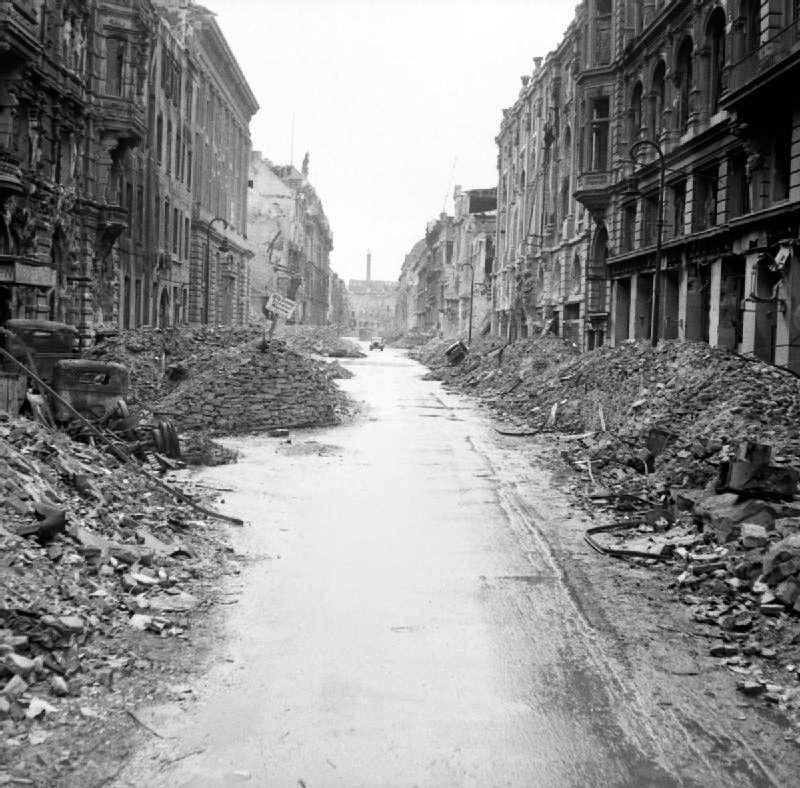 A devastated street in the city centre just off the Unter den Linden after Battle of Berlin. Photo by No 5 Army Film & Photographic Unit. Photo Public Domain via <a href="https://www.goodfreephotos.com/">Good Free Photos</a>