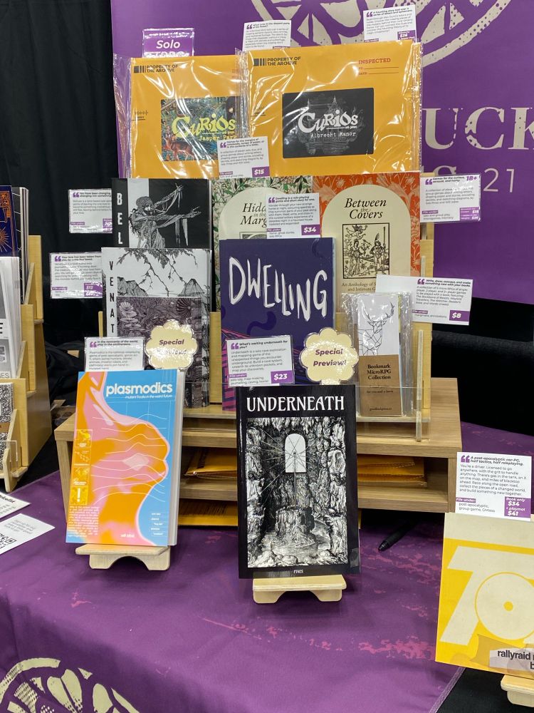 the good luck booth looking resplendent at gen con!
