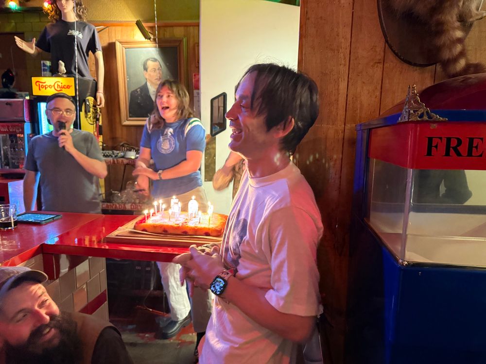 Danny backglass with a birthday cake.
