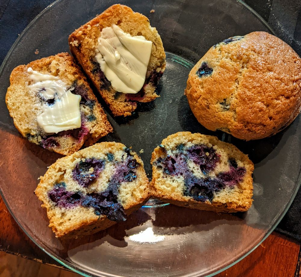 An image of improperly baked blueberry muffins in which the blueberries have sunk to the bottom. When a muffin is sliced in half, an angry blueberry Gordon Ramsay can be seen criticizing the baker's poor technique.