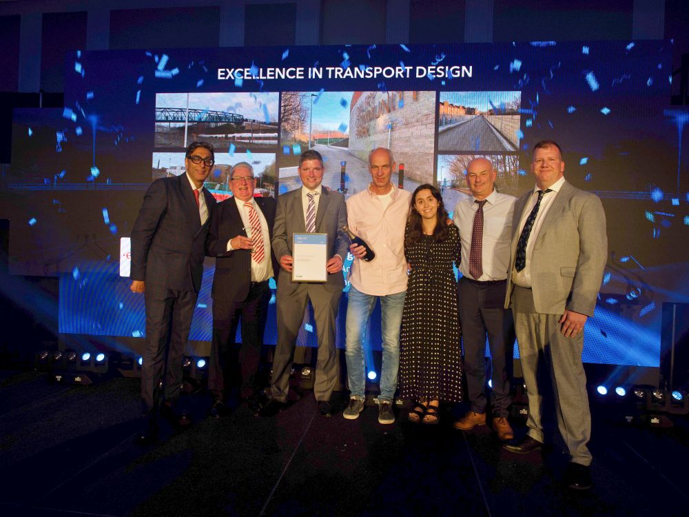 Colleagues collect the Excellence in Transport Design award for the Roseburn to Union Canal project at the Scottish Transport Awards 2025.
