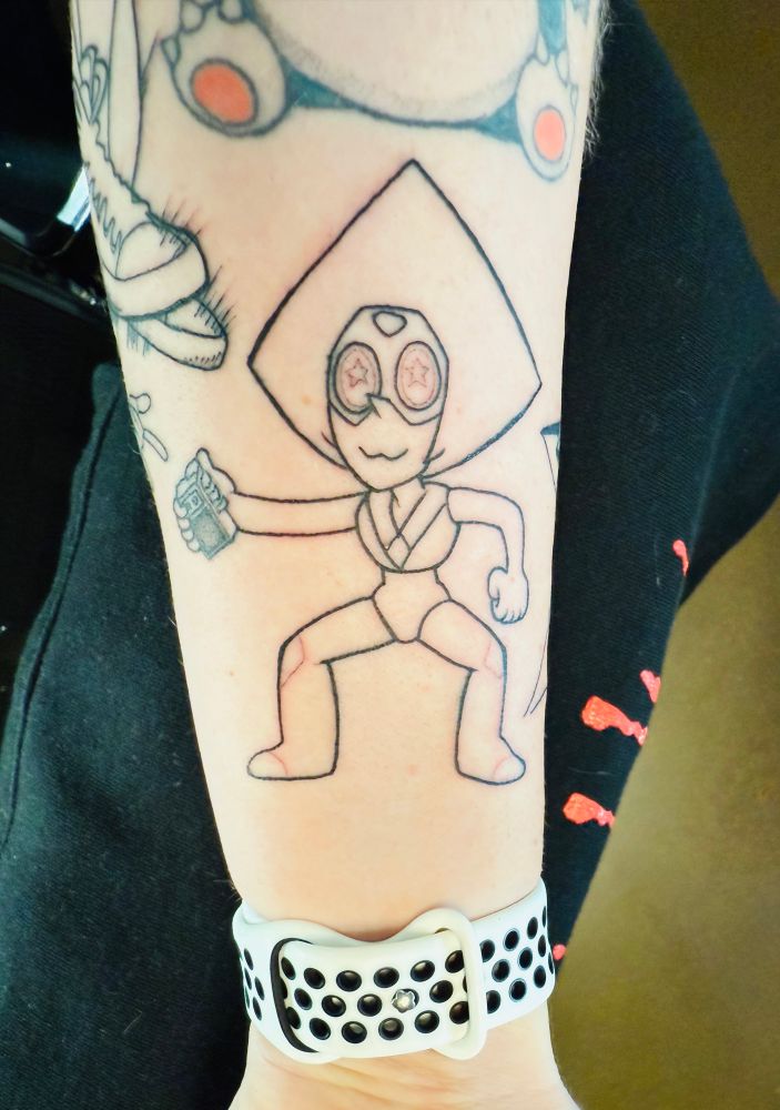 Forearm tattoo. Just the line work pre shading and color of Peridot from Steven Universe! 
