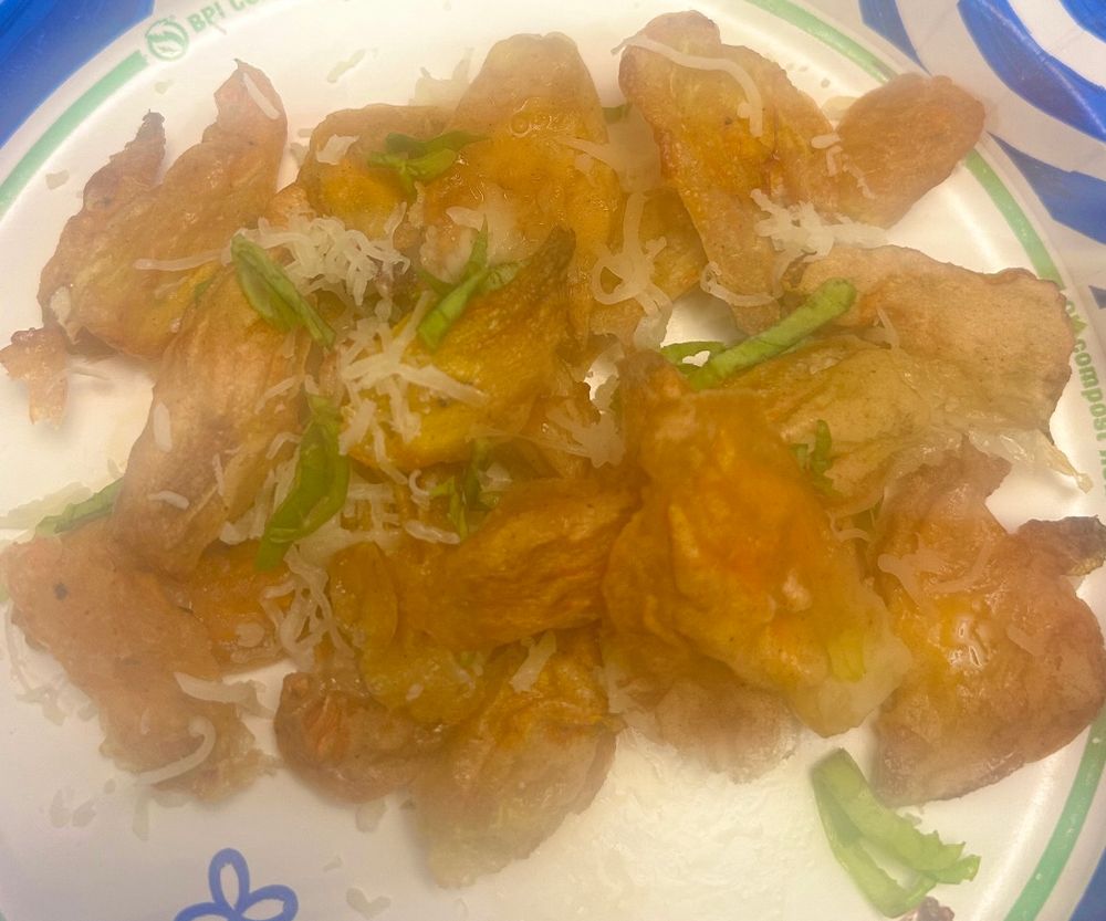 Zucchini flowers stuffed w mozzarella in a yummy seasoned beer batter dipped in marinara tastes like natures most yummiest mozzarella stick