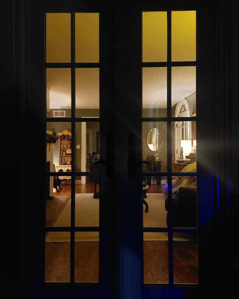 looking inside a house through french patio doors