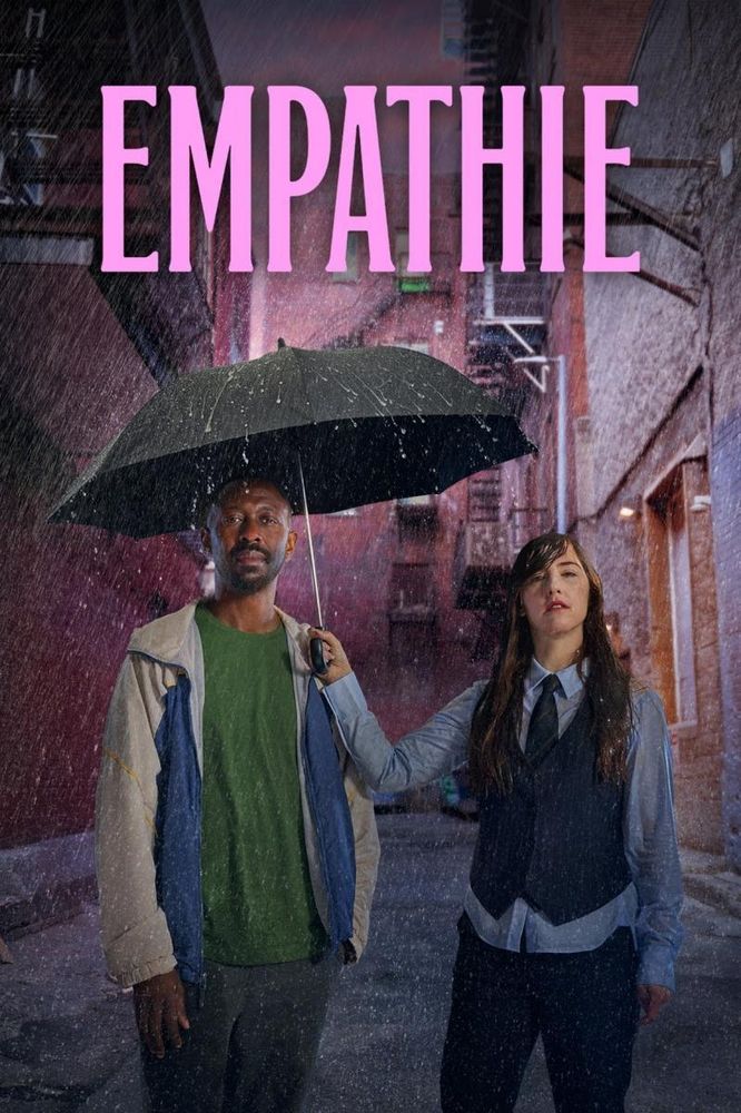 Affiche de la série Empathie, on y voit les deux acteurs principaux sous un parapluie dans une rue