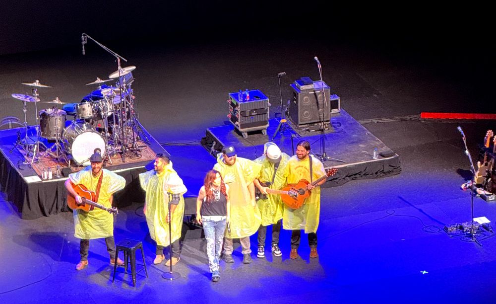Jo Dee Mesina performing at the OLG Niagara Falls. The band played a joke on her & were dressed in Niagara's raincoats when she performed Bring on the Rain.