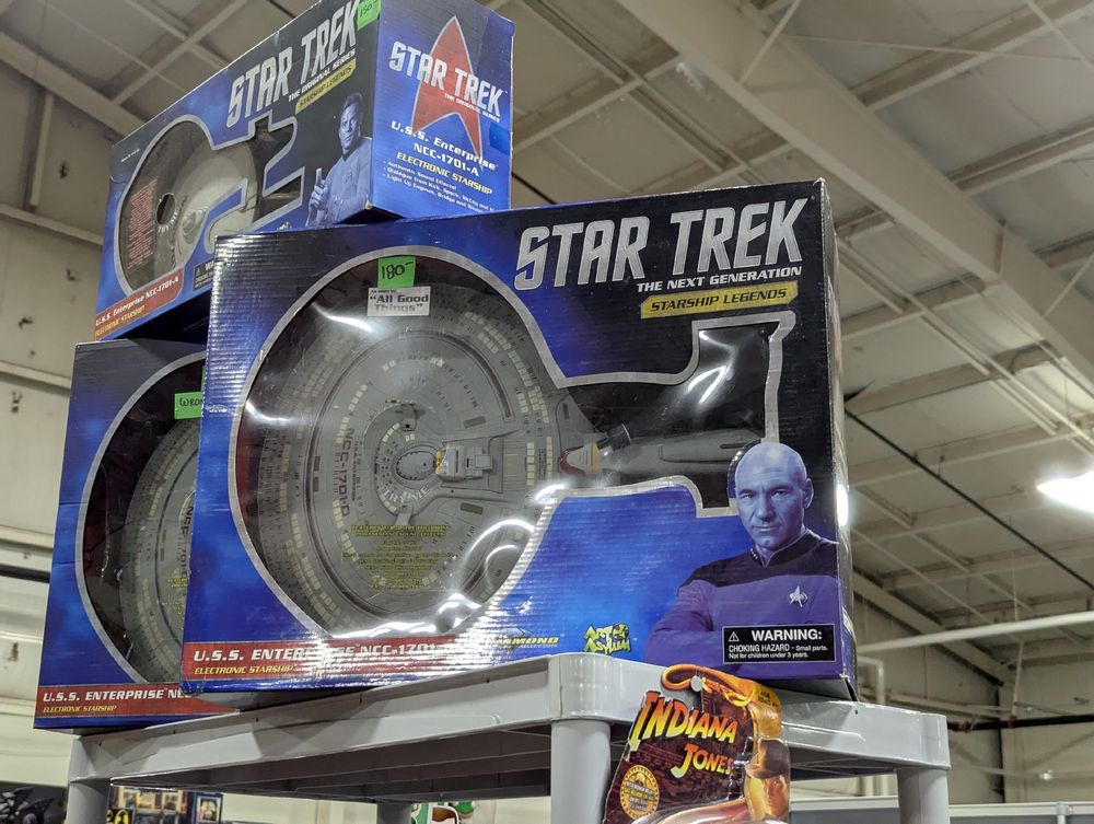 A large toy of the 3-nacelled Enterprise D from All Good Things