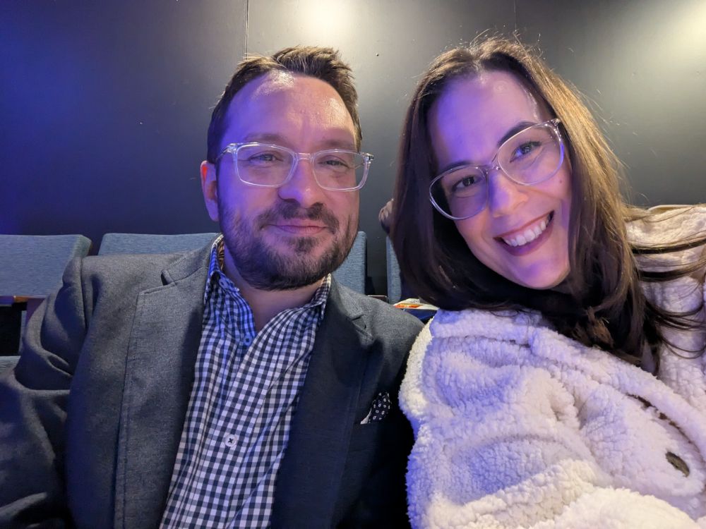 A man and a woman smiling 