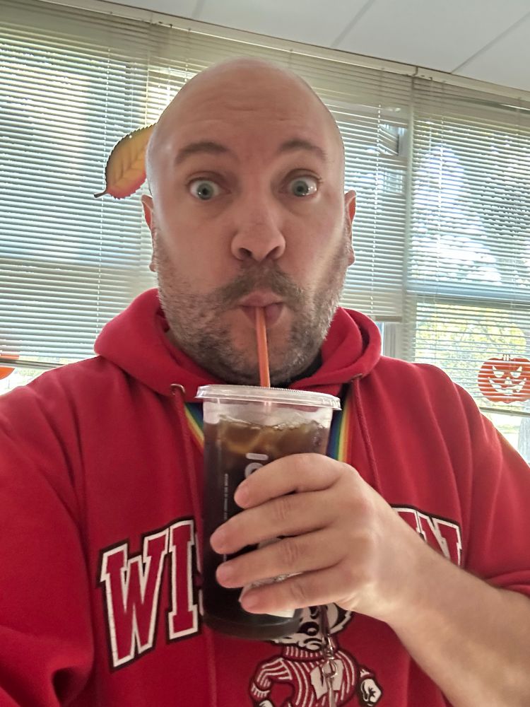 Me drinking an iced coffee 