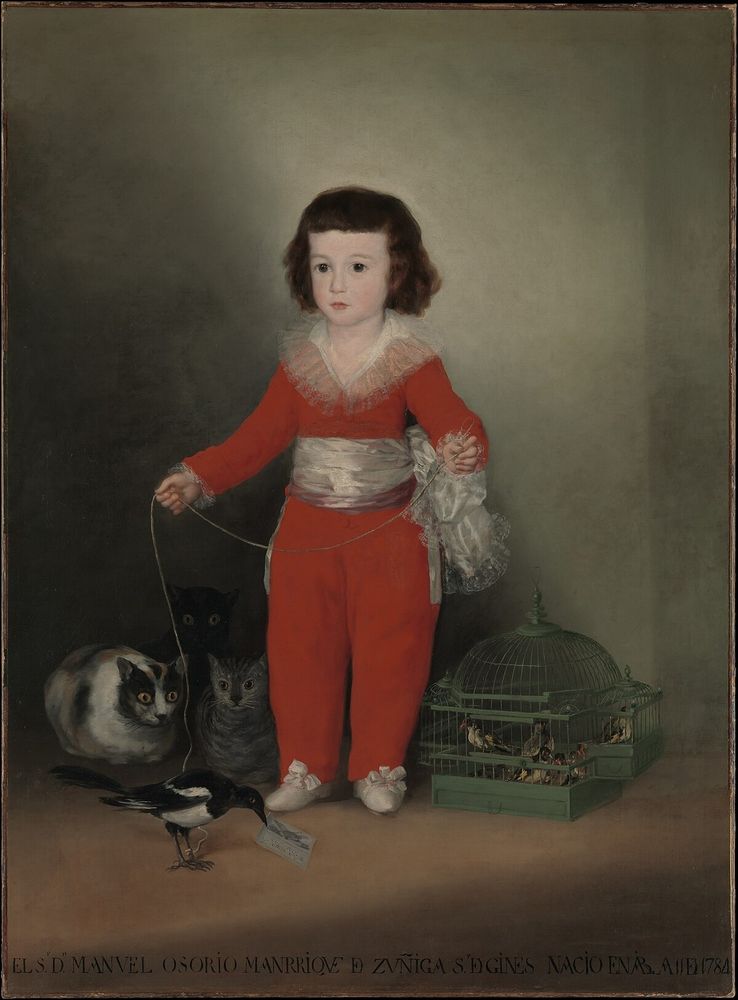 A young child in a red outfit stands holding a string attached to a magpie in the foreground, with two cats (one calico and one with stripes) nearby. Beside them is a green birdcage. The child has a solemn expression, and the background is a muted neutral tone.