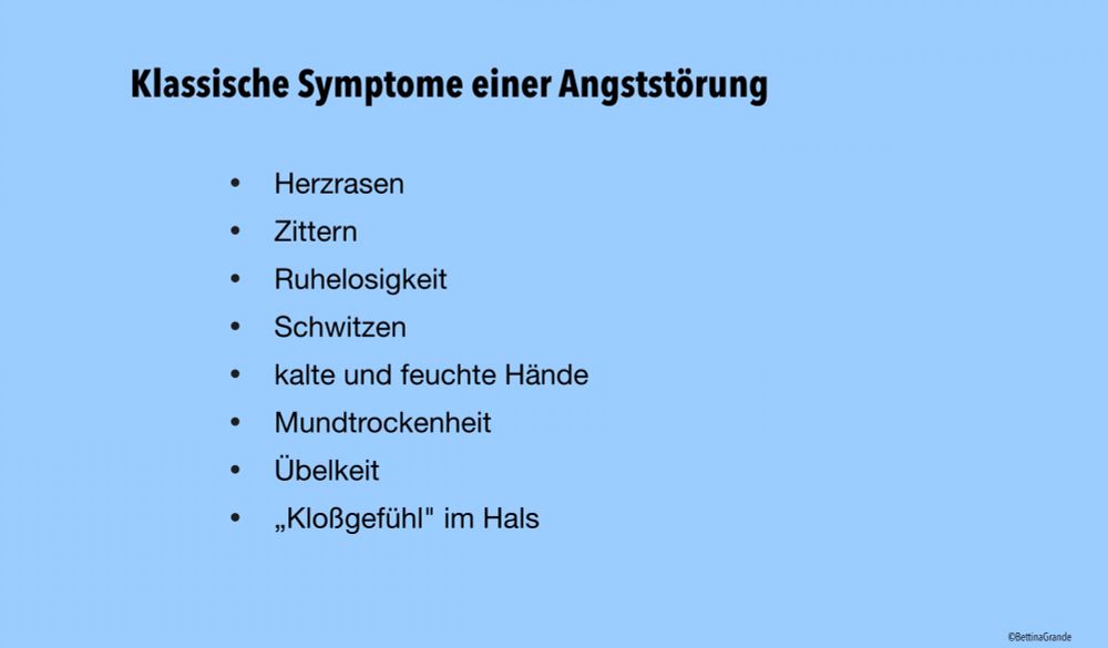 Folie mit der Überschrift „Klassische Symptome einer Angststörung“. Aufgelistet: Herzrasen, Zittern, Ruhelosigkeit, Schwitzen, kalte und feuchte Hände, Mundtrockenheit, Übelkeit, „Kloßgefühl“ im Hals.