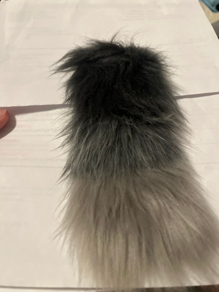 Fur swatches of charcoal, grey, and stone luxury shag