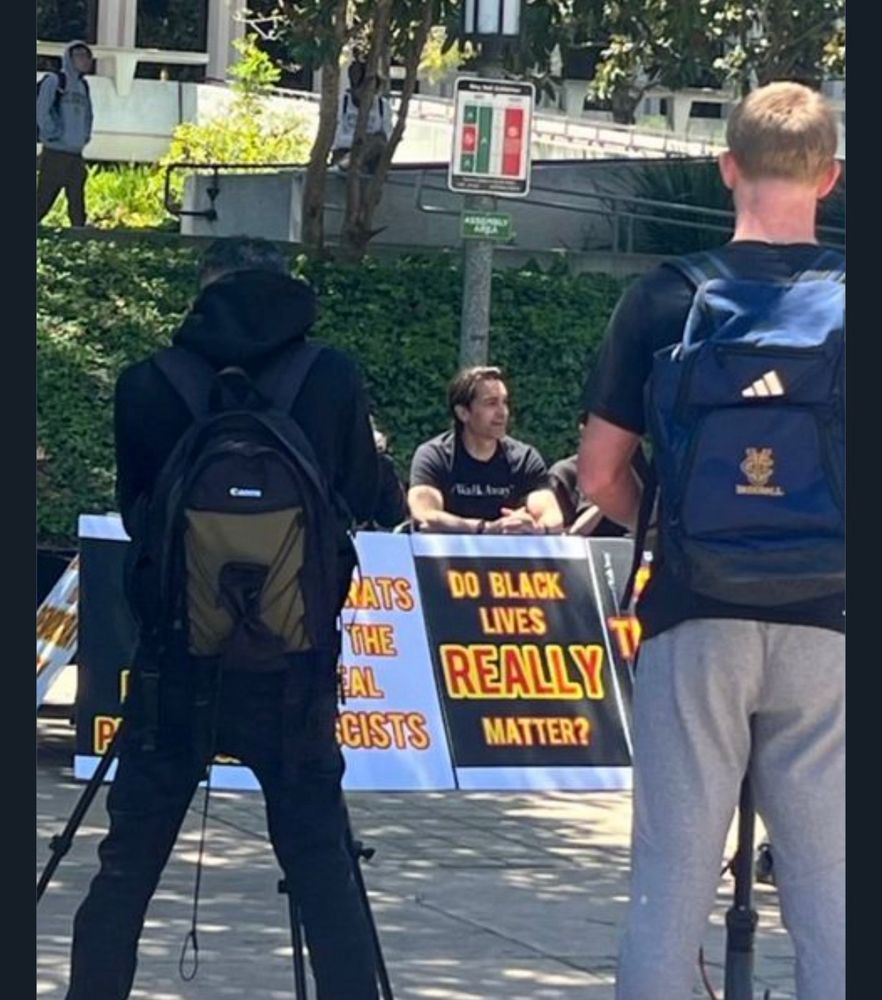 Tabling at UC Irvine, #WalkAway displays sign that says “do Black lives really matter?”
