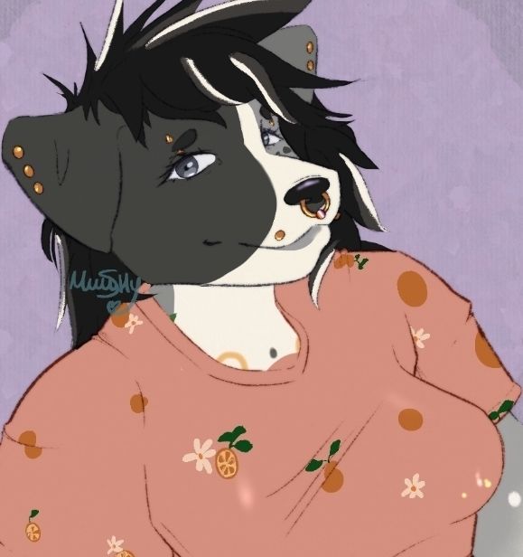 Art of an anthro dog. She's sitting on the floor and smiling at the viewer. 