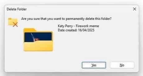 A windows confirmation dialogue asking if the user wishes to delete a folder named “Katy Perry - Firework Meme”