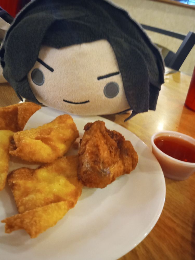 I think even after there's nothing left of my dad he still would not say no to a Chinese buffet. Here's a plate of crab rangoon and a fried wing at a chinese buffet. My large V bean is also enjoying.