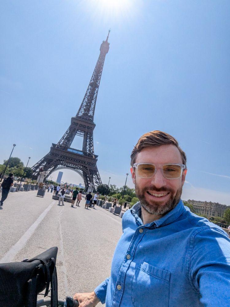 Me on a bike in front of the Eiffel Tower
