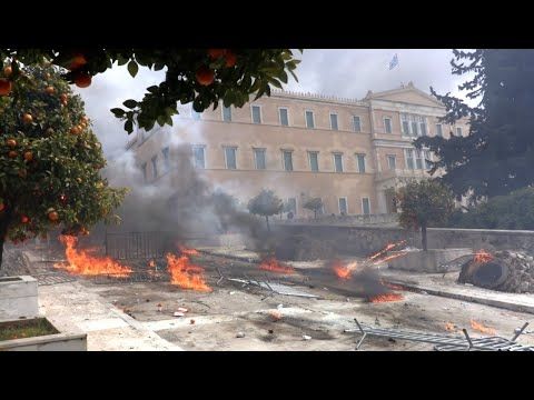 MASSIVE RIOTS in Athens, in the LARGEST demo EVER. Protesters BREACH the PARLIAMENT with MOLOTOVS