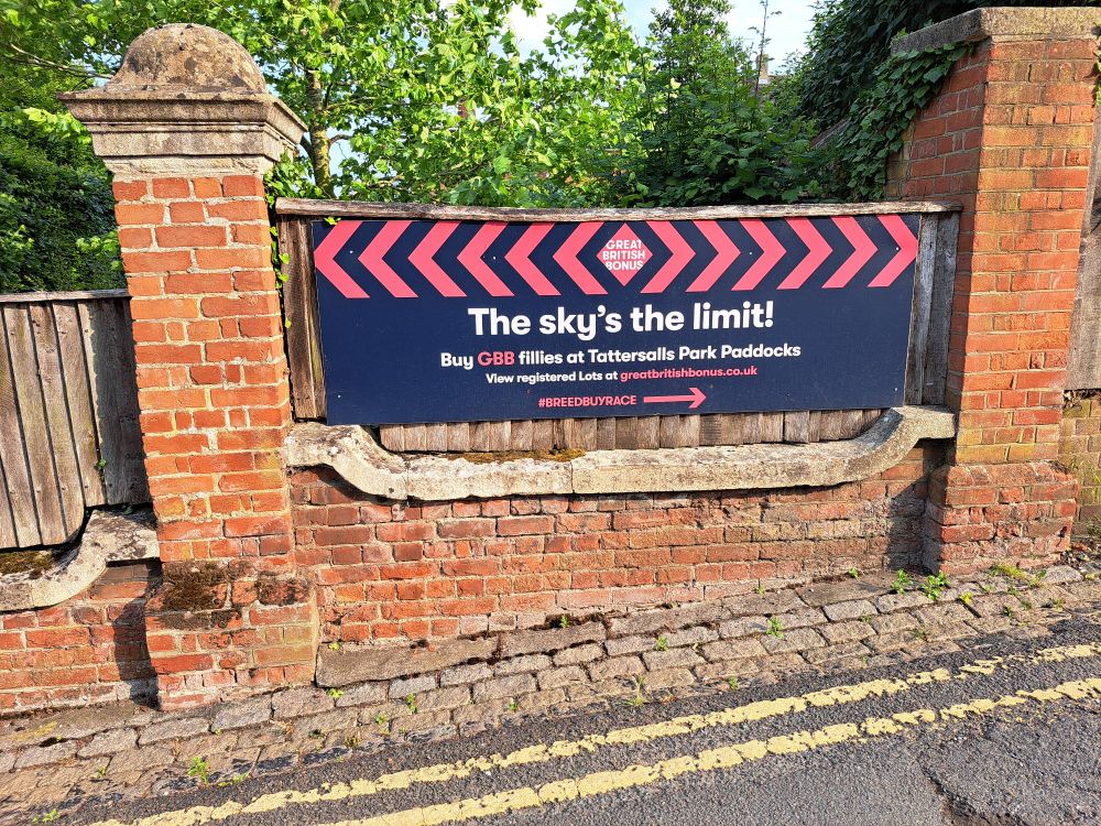 sign on fence advertising 