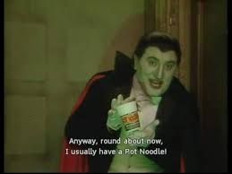 Alexei Sayle as a vampire driving instructor from the Transvaal in 'The Young Ones', promoting Pot Noodles