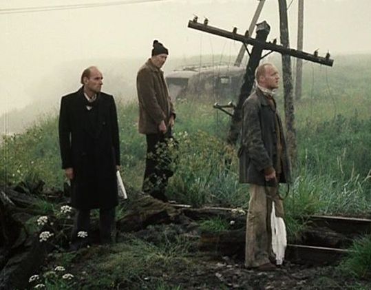Three men in the misty Zone in Tarkovsky's 'Stalker'