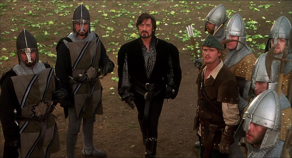 Sheriff of Rottingham & Robin Hood surrounded by guards and looking up