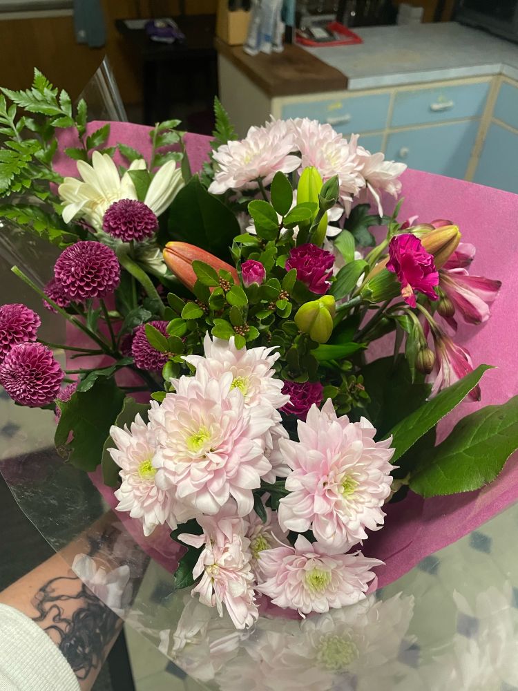 Photo of beautiful light and dark pink floral bouquet 
