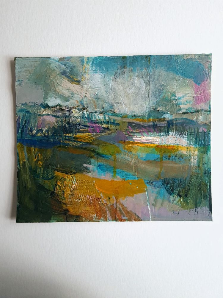 Expressive landscape painting with mustard, blue and grey colours by Julia Laing on a white background.