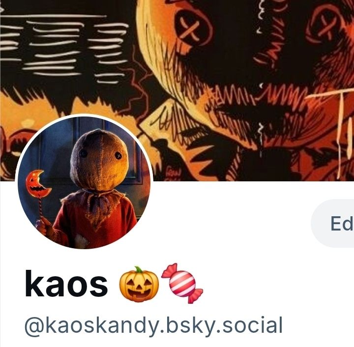 New pfp of Sam from Trick T Treat, the banner is a clip of the comic, a closeup of his mask