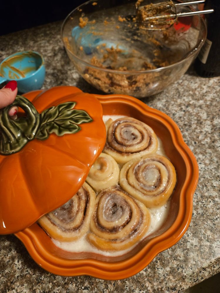 Cinnamon rolls in a ceramic pumpkin dish