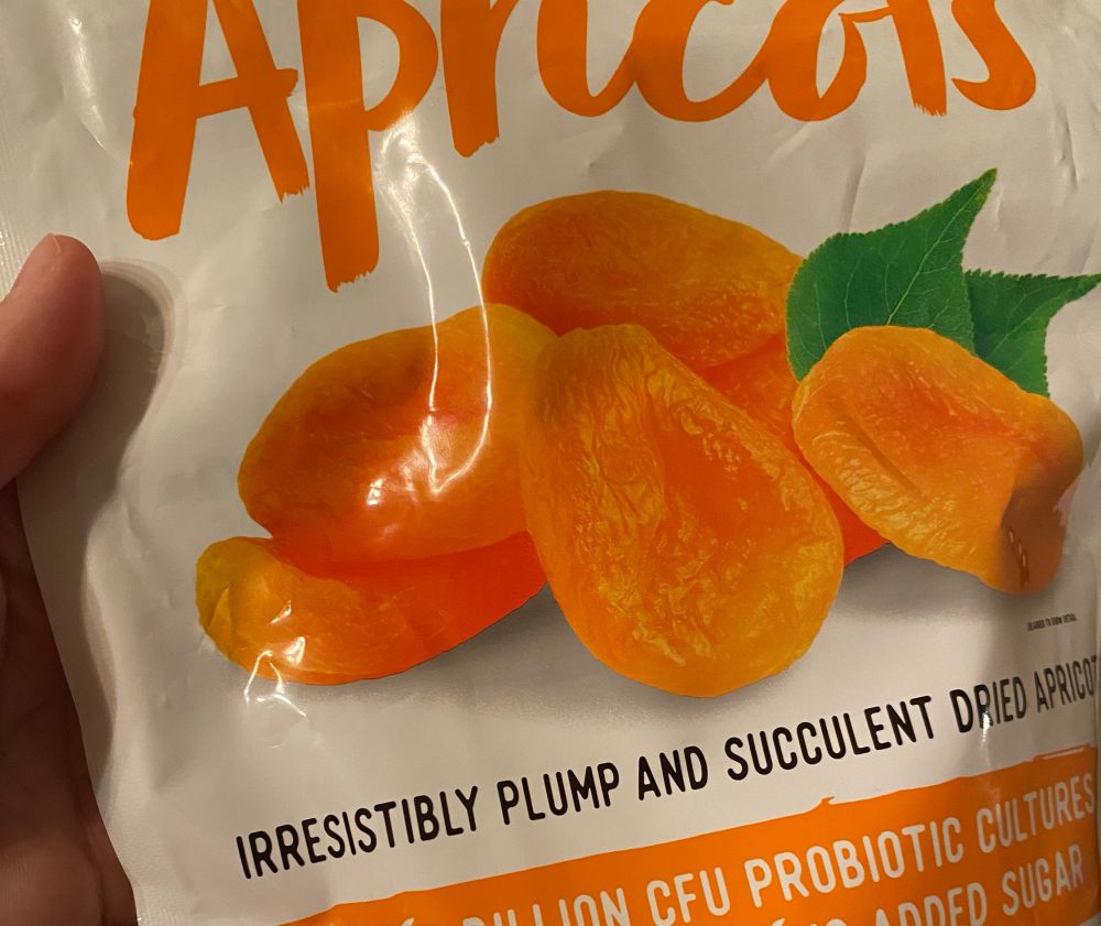 bag of dried apricots with text describing them as “irresistibly plump and succulent”