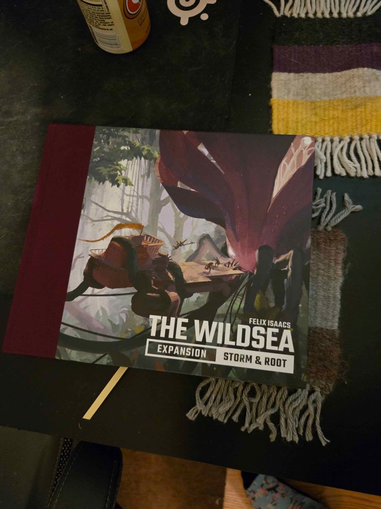 Cover of The WIldsea storm and root expansion. It's a giant flower with a ship tiling towards it. 