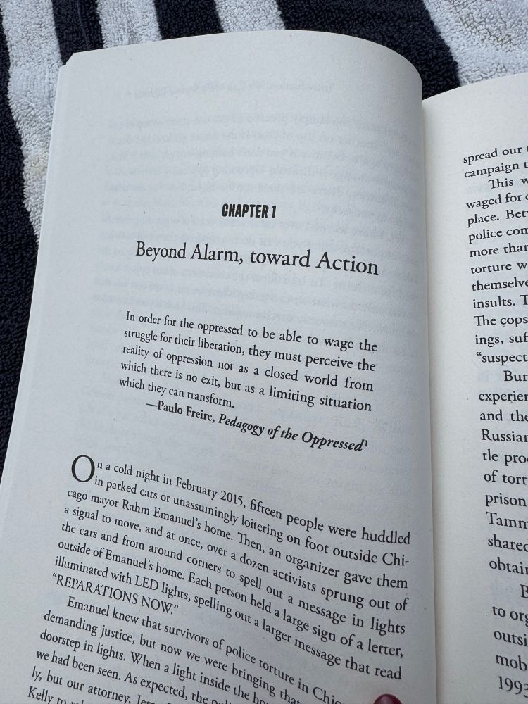 A photo of an open book reading…

Chapter 1: Beyond Alarm, toward Action

Followed by a quotation from Paolo Freire’s Pedagogy of the Oppressed, “In order for the oppressed to be able to wage the struggle for their liberation, they must perceive the reality of oppression not as a closed world from which there is no exit, but as a limiting situation which they can transform.”
