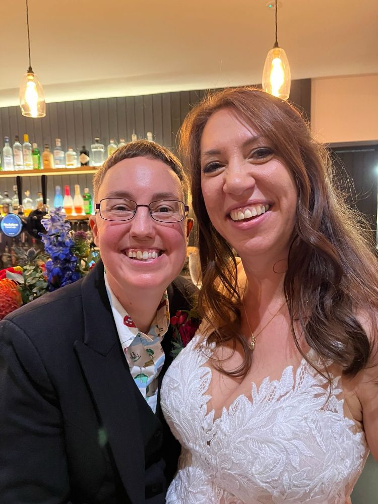 Emily and Tabitha are filling the photo and grinning hugely.