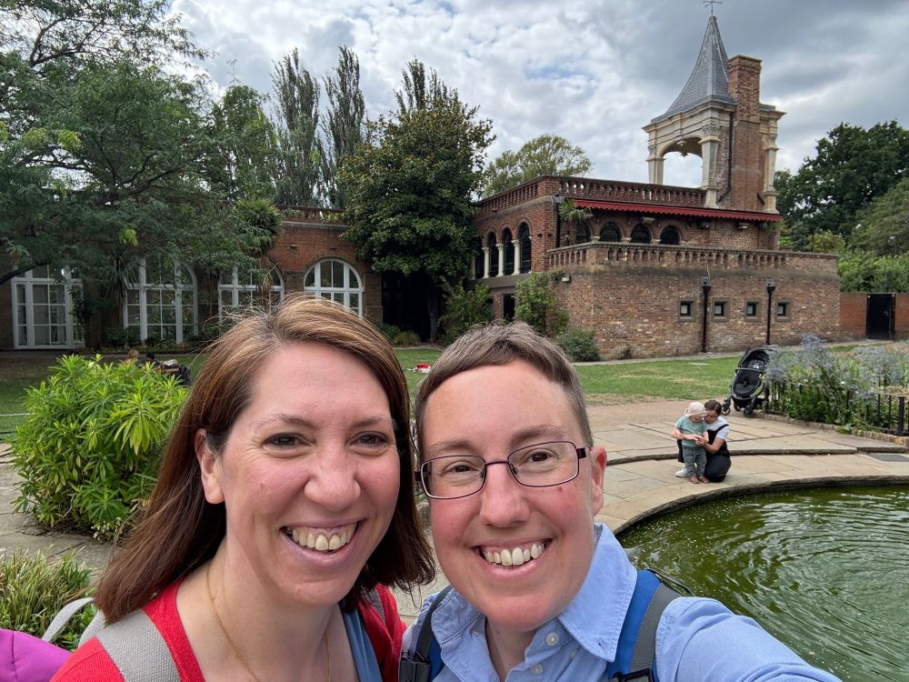 Selfie of Emily and Tabitha standing in front of an old building in Holland Park.