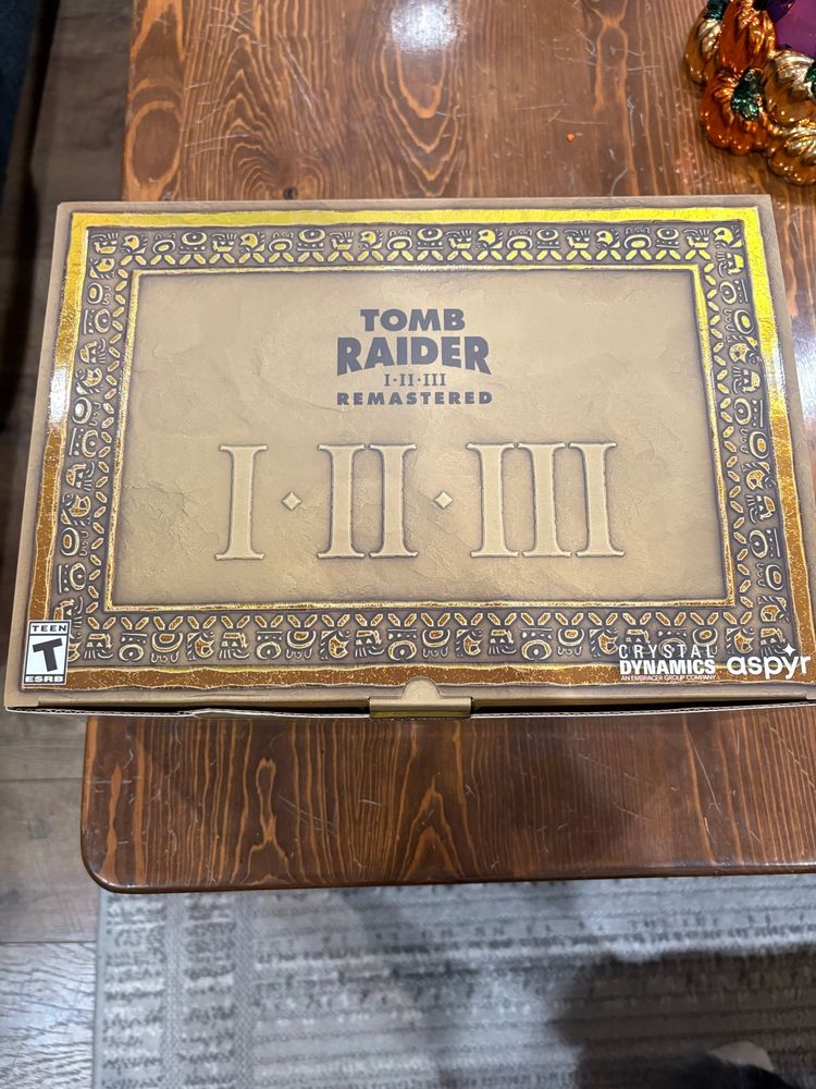 A collectors box that says “Tomb Raider 1 2 3 Remastered” 