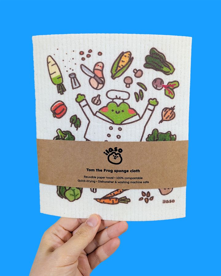 The same dishcloth, but with a belly band with my (ilaso) logo and a brief description of the product, printed on brown kraft paper.