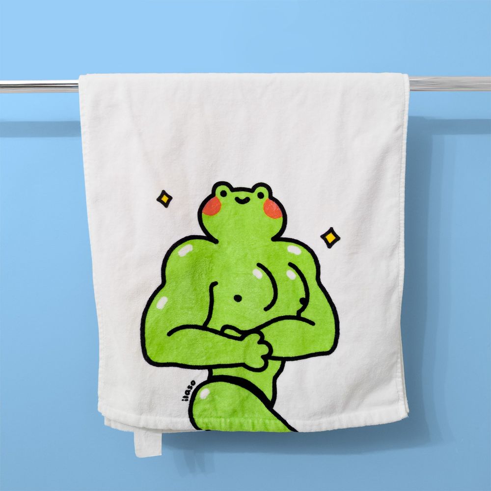 hand towel with a buff frog design on it