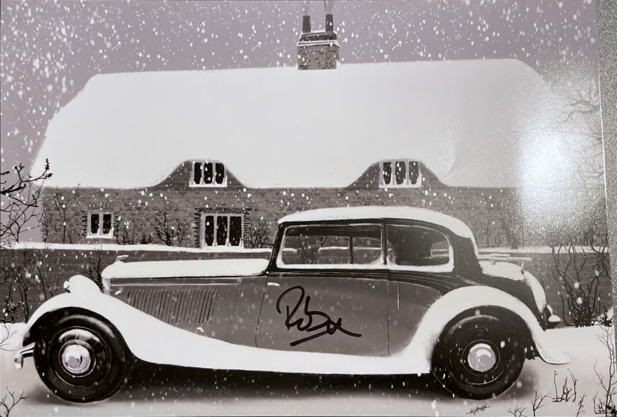 A print of a Bentley in the snow signed by Rob Wilkins