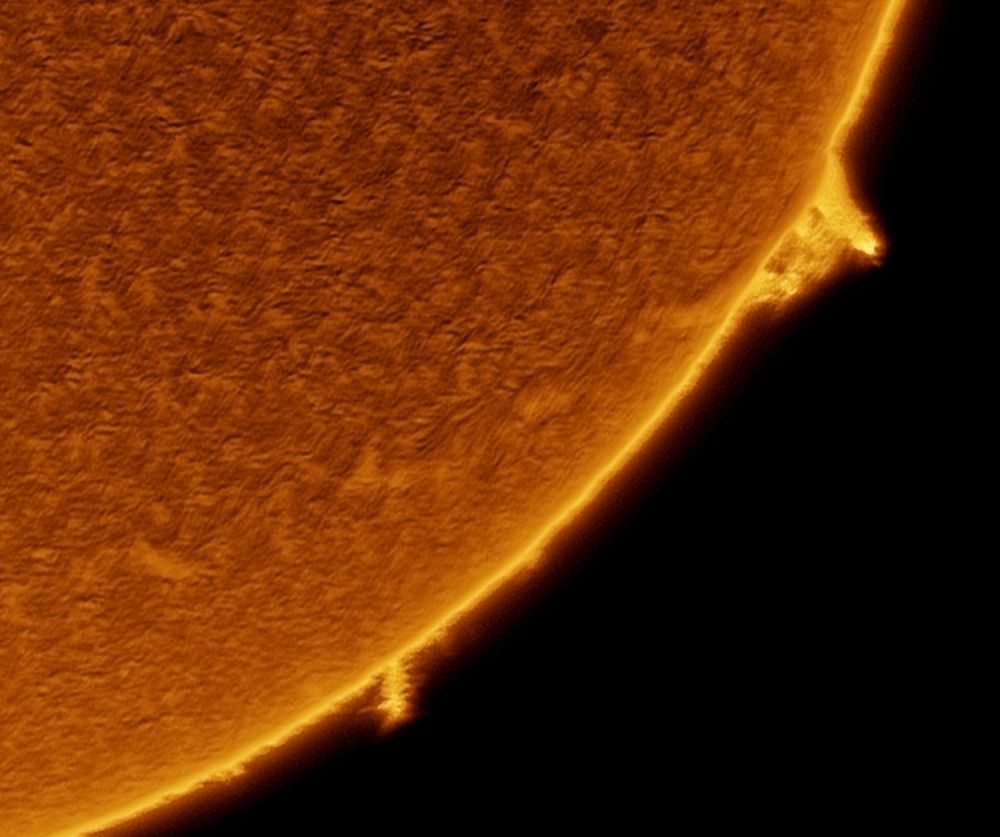 Zoomed image of the Sun's SE limb, showing two prominences with a long filament leading to the larger prominence