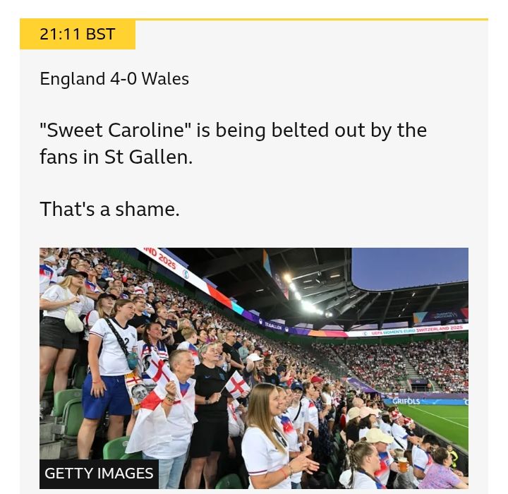 Screen shot of BBC sport text updates with a photo of fans at England Vs Wales. The update says Sweet Caroline is being belted out by the fans in St Gallen. That's a shame.