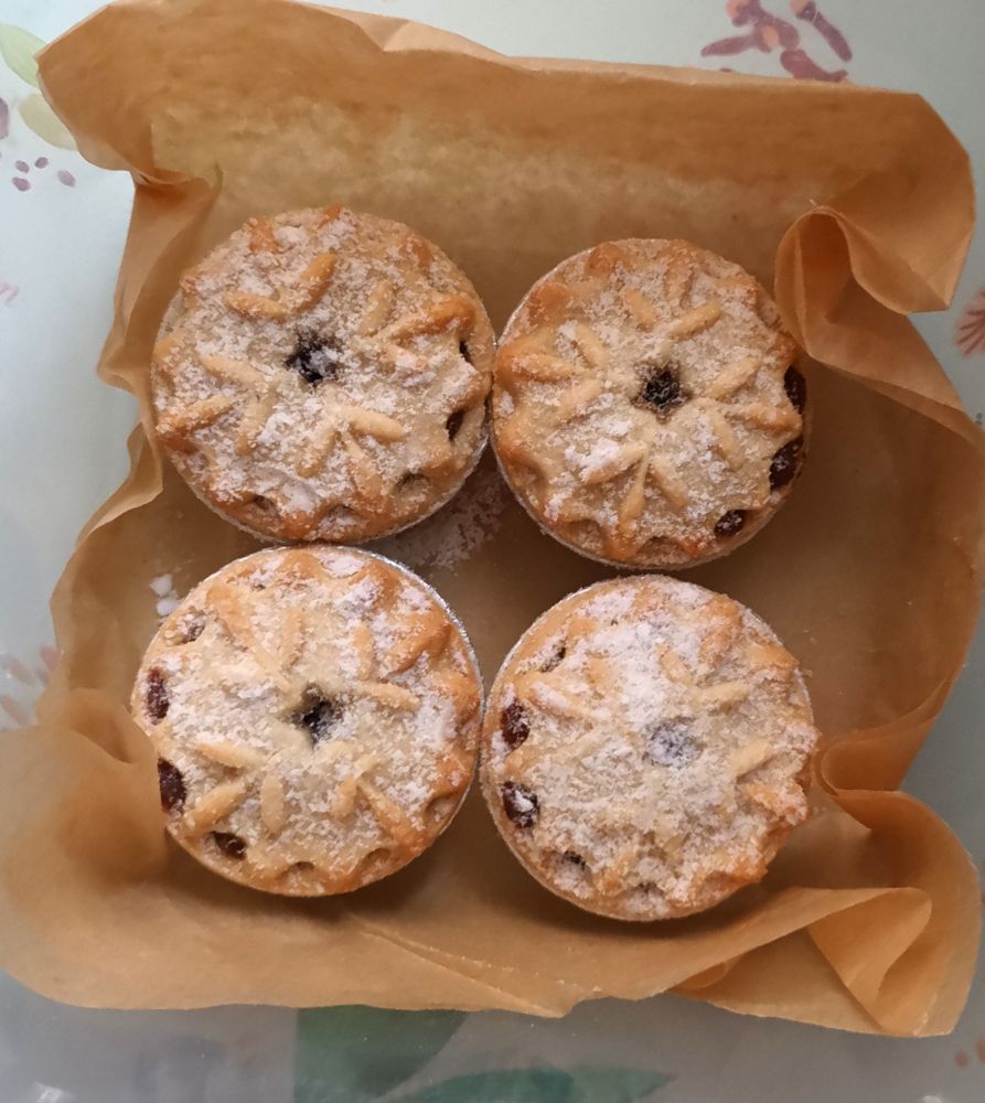A 'tuppaware' box containing 4 mini mince pies. bought recently from Marks & Spencer - they are delicious