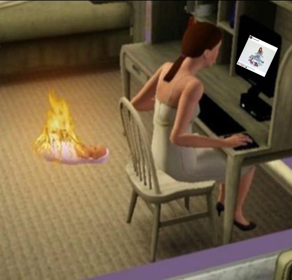 A sim is on the computer where it show the post Taylor made about owning her masters. Behind the sim on the computer is a baby on fire.