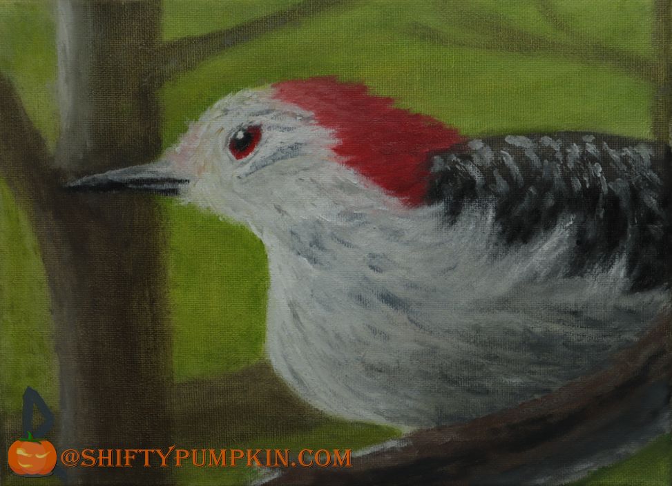 8"x10" oil painting of a woodpecker against a green forest background