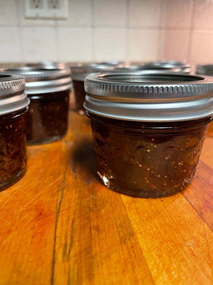 Processed jars of bourbon sage fig jam 