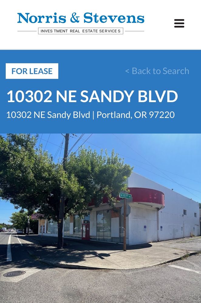Screenshot of a Norris & Stevens real estate listing on NE Sandy, which appears to be the building pictured near the bike lane obstruction. The building is identifiable by its bright red awning, as well as by the facade with large front windows and panels of unpainted plywood.