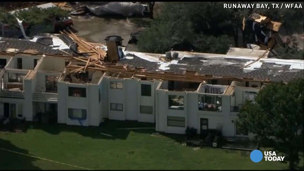 An apartment complex in Texas where the roof has been ripped off by a tornado.